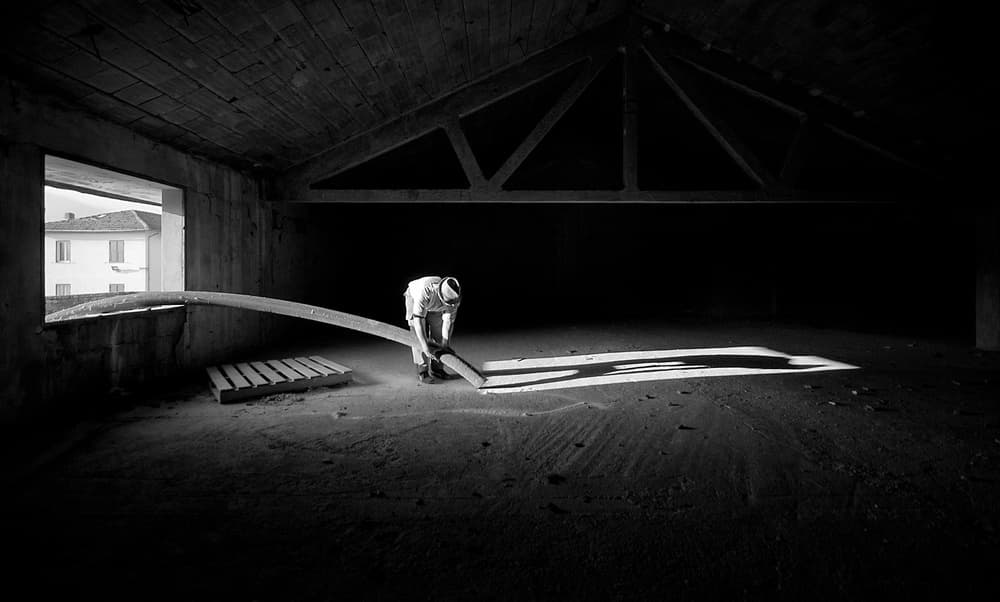 Lone Worker In Attic by Carlo Ferrara — canvas wall art