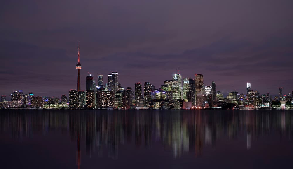 Luminous City Reflections by C.S. Tjandra — canvas wall art