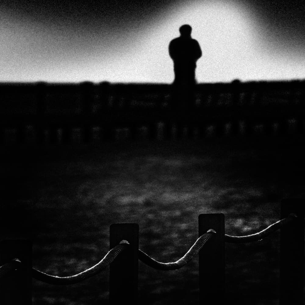 Lonely Man Silhouette by Paulo Abrantes — canvas wall art