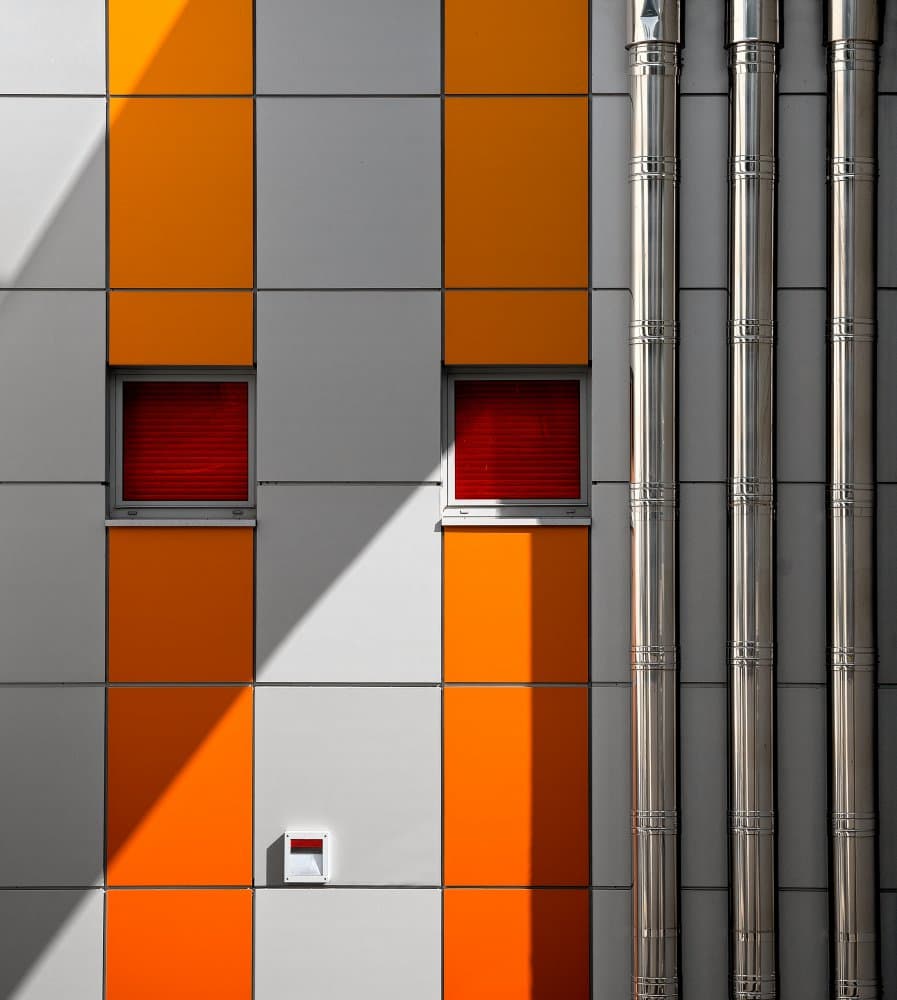 Geometric Orange Facade by Tomasz Buczkowski ( Tomush ) — canvas wall art