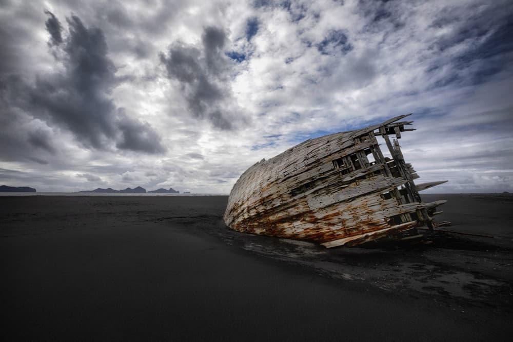 Shipwreck on Black Sands by Þorsteinn H. Ingibergsson — canvas wall art