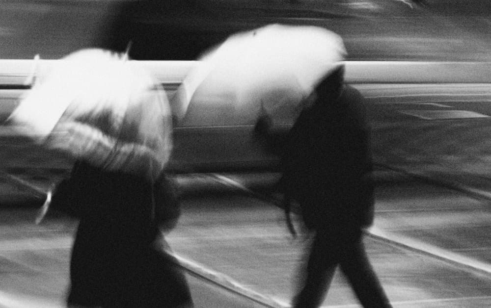 Blurred Umbrellas In Motion by Jian Wang — canvas wall art