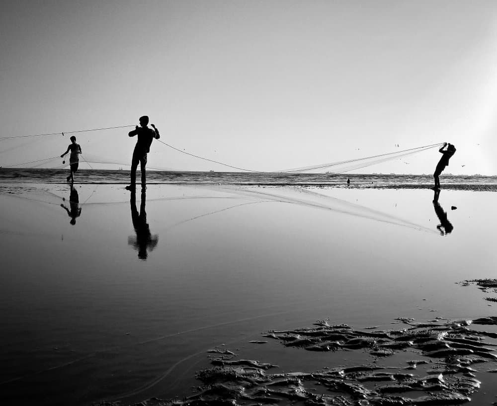 Coastal Fishing Reflections by Qmars Khoshsefat — canvas wall art