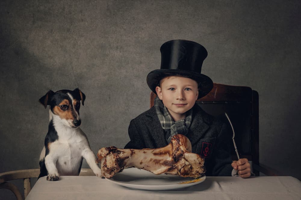 A Boy and His Bone by Monika Vanhercke — canvas wall art