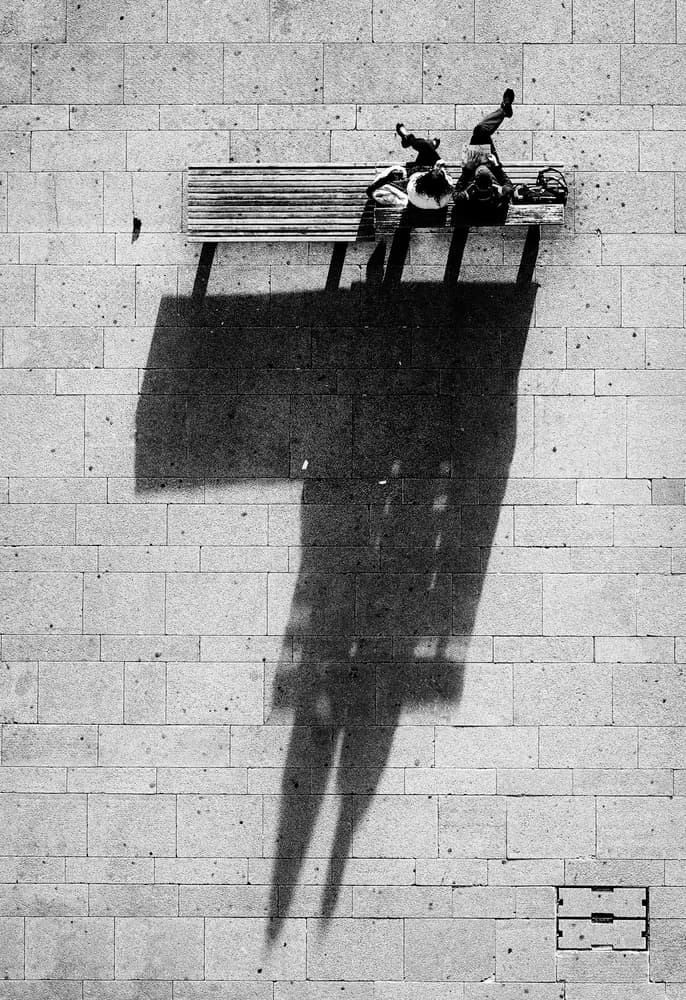 Relaxed City Bench Shadows by Jorge Pena — canvas wall art