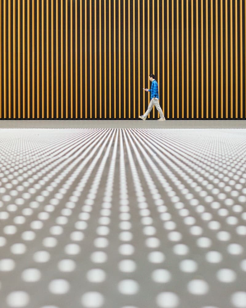 Man Walks Modern Hallway by Yasuhiro Takachi — canvas wall art