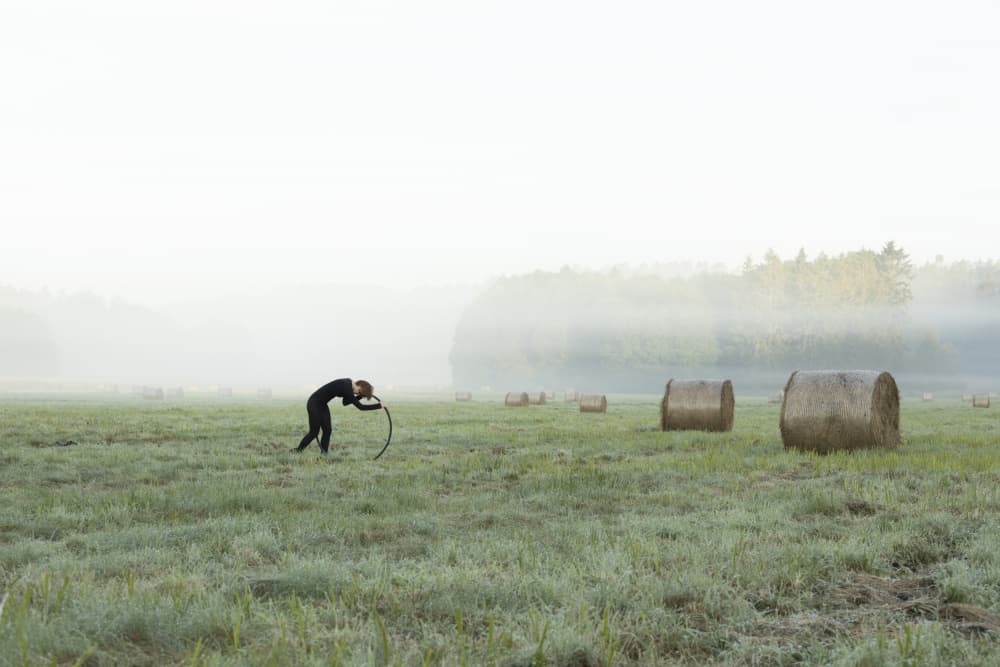 Solitary Figure Misty Field by Leszek Paradowski — canvas wall art