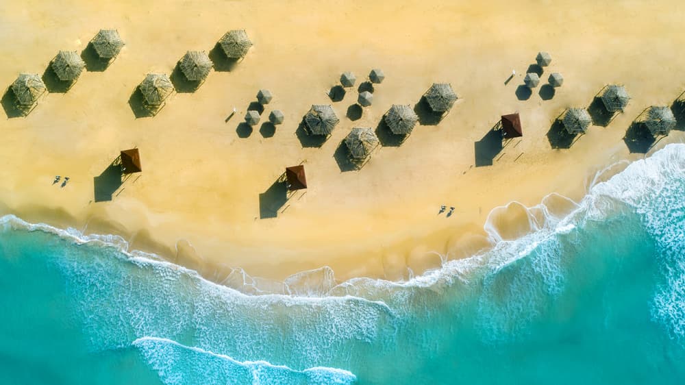 Golden Sand Turquoise Ocean by Wisam Hassan — canvas wall art