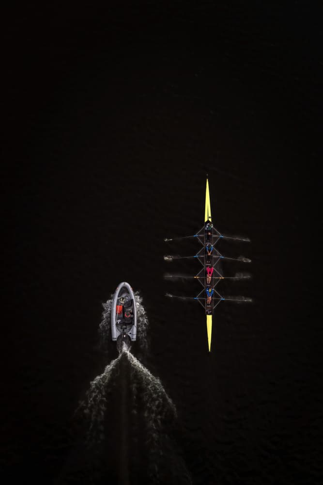 Dynamic Rowing on Dark Water by Deming W — canvas wall art