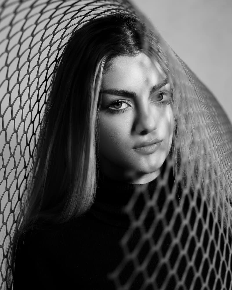 Woman Behind The Net by Amin Hamidnezhad — canvas wall art