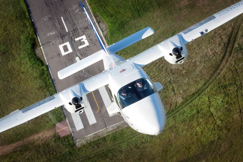 Twin Engine Flight by Piotr Wrobel — canvas wall art