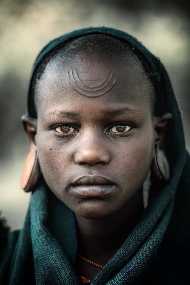 African Scarification Portrait by Trevor Cole — canvas wall art