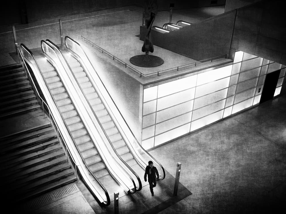 Solitary Escalator Journey by Bruno Flour — canvas wall art