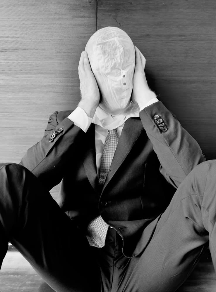 Hidden Face Businessman by Davide Barzaghi — canvas wall art