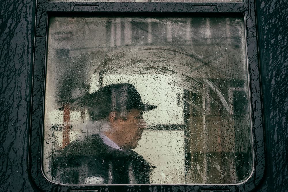 Pensive Man Rainy Window by Sorin Vidis — canvas wall art