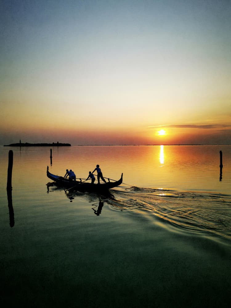 Rowboat at Golden Sunset by Angelo Cerantola — canvas wall art