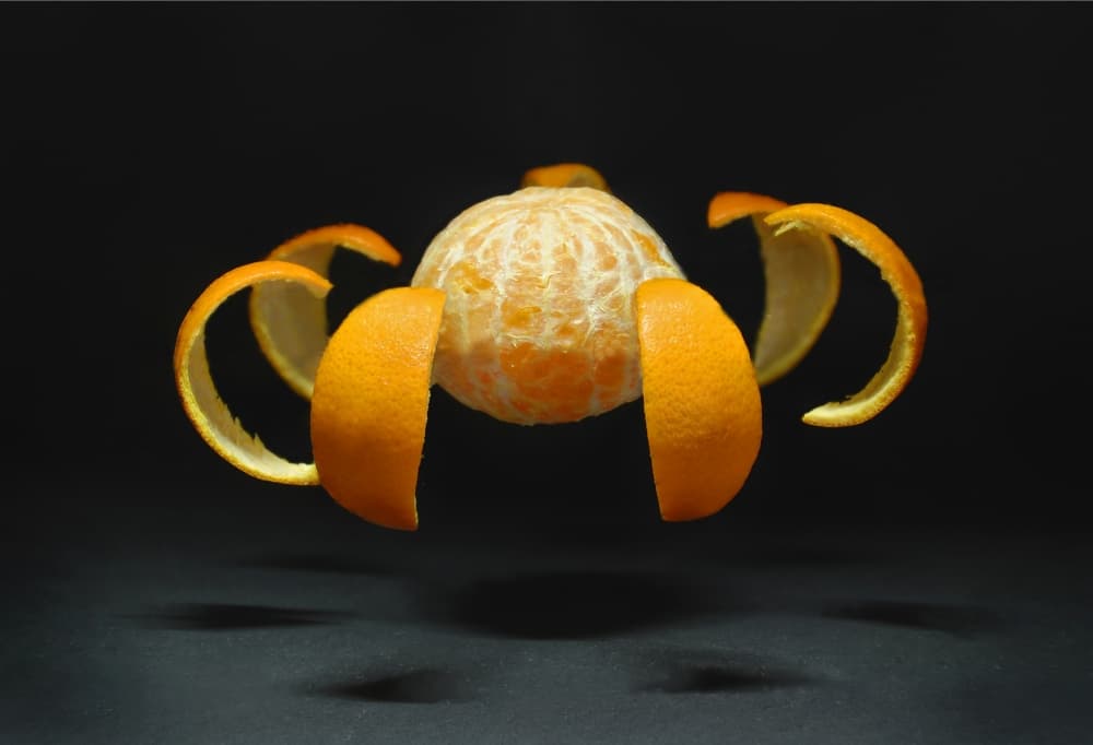Peeled Orange Levitation by Leon — canvas wall art