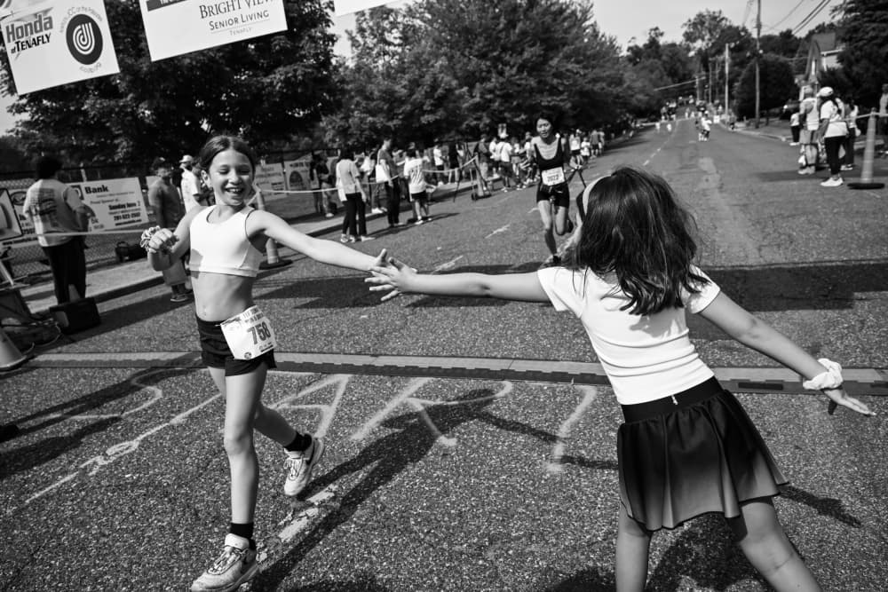 Finish Line High Five by Tong Zhang — canvas wall art