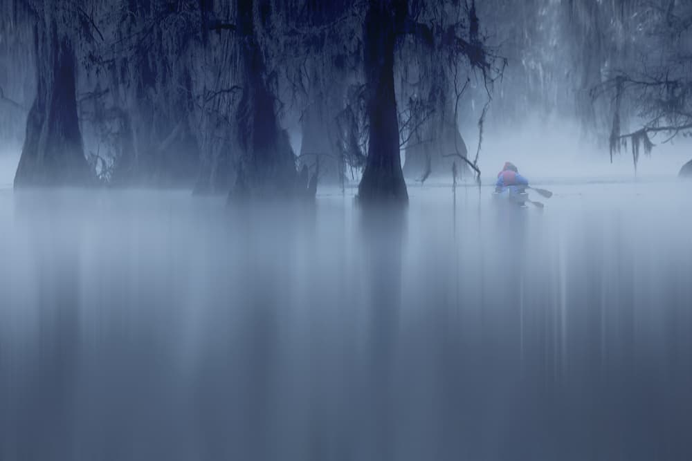 Misty Cypress Kayak by Yun Thwaits — canvas wall art