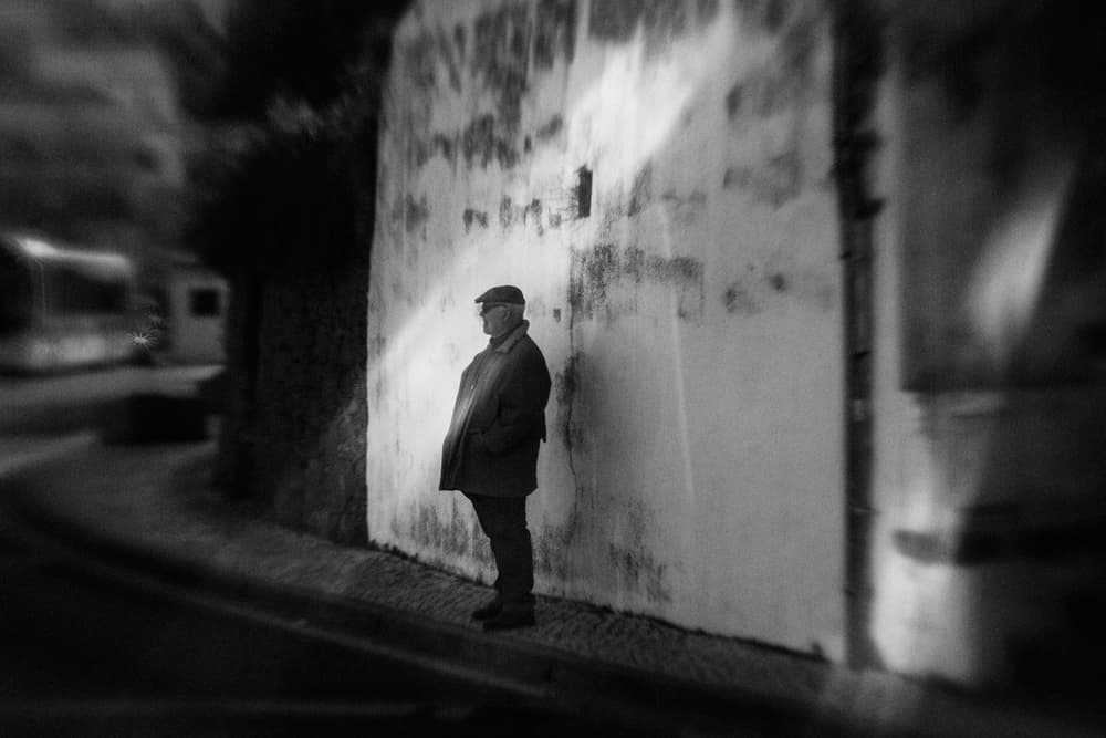 Pensive Man City Night by Laura Mexia — canvas wall art
