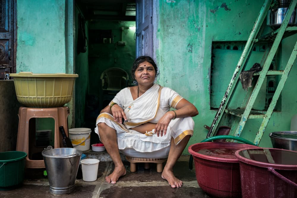 Indian Woman Doorstep by Elizabeth Cowle — canvas wall art
