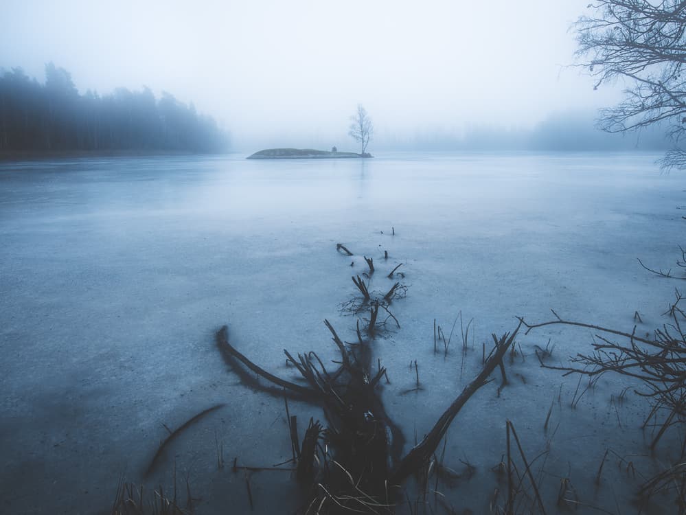 Misty Frozen Lake by Christian Lindsten — canvas wall art