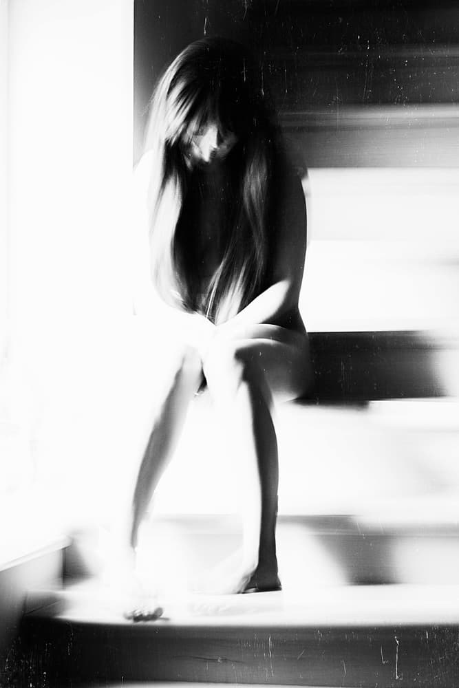 Vulnerable Woman on Stairs by Bogdan Bouşcă — canvas wall art