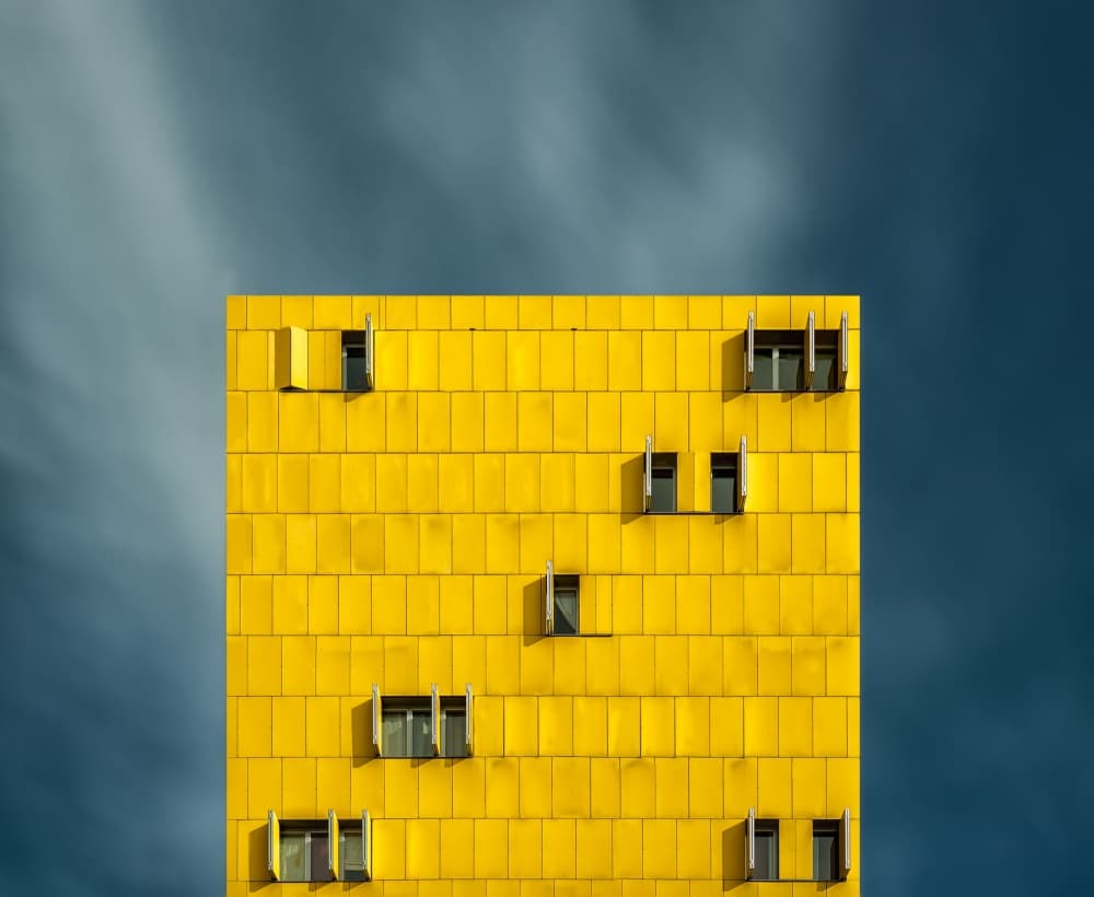 Bright Yellow Building by Vladi Garcia — canvas wall art