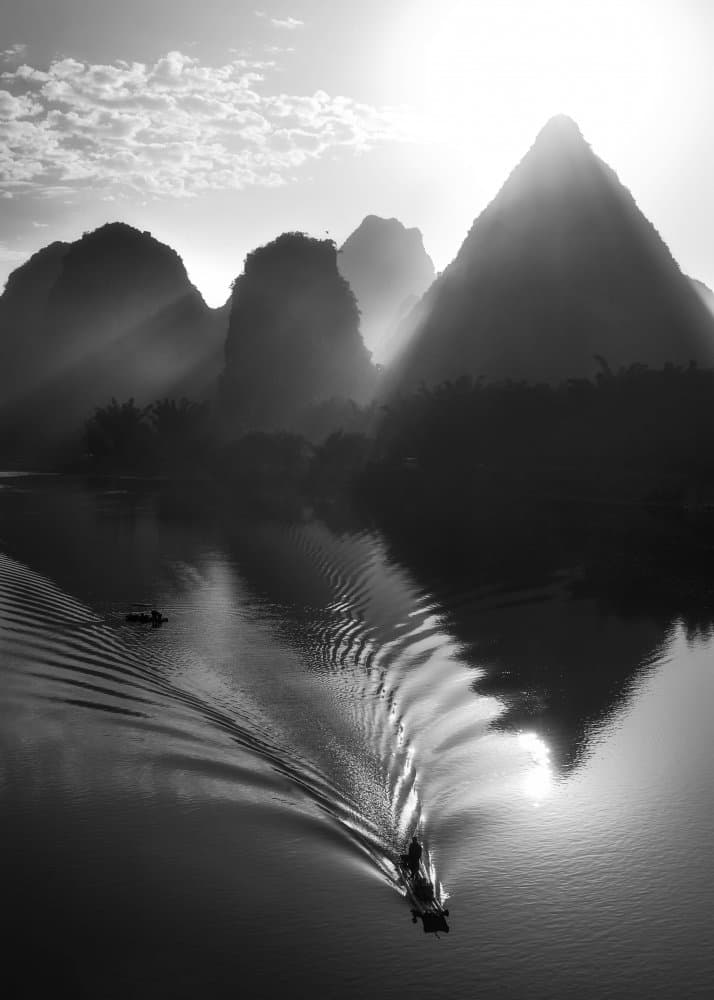 Misty Mountain River Boat by Fabrizio Massetti — canvas wall art