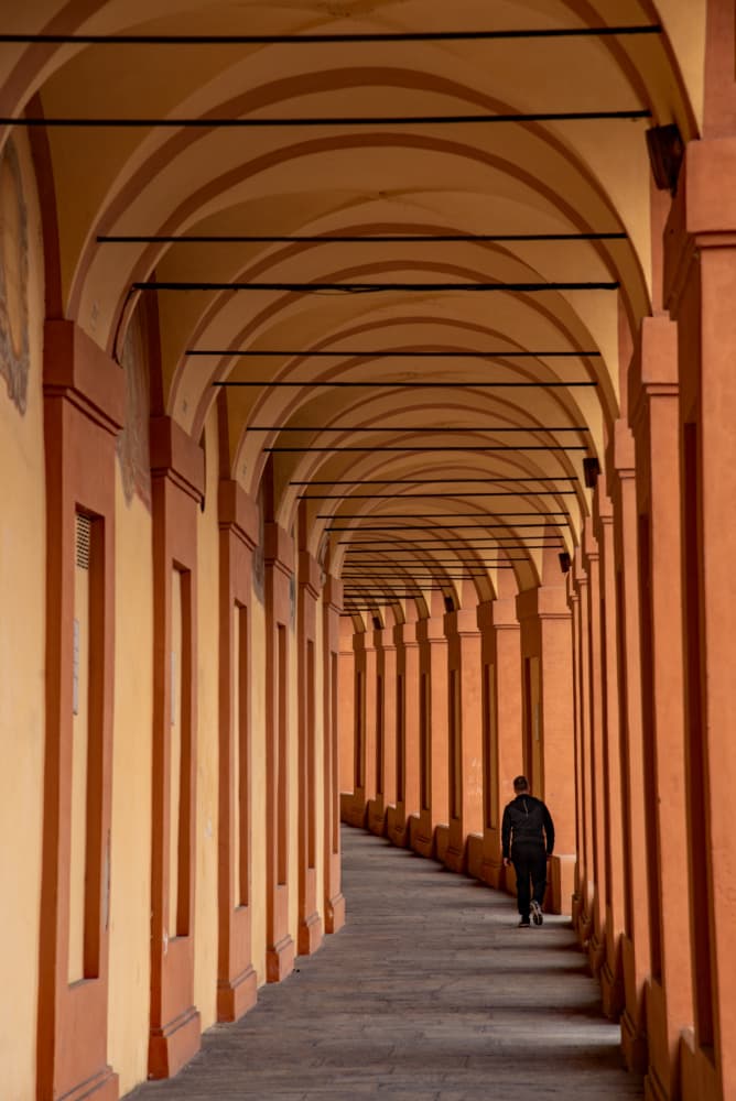 Solitary Walk Under Arches by Barbara Nussel — canvas wall art