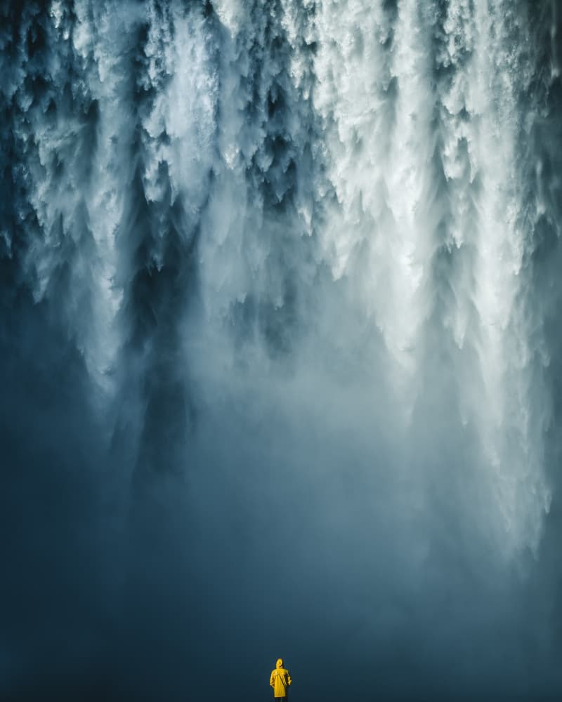 Explorer At Waterfall by Witold Ziomek — canvas wall art