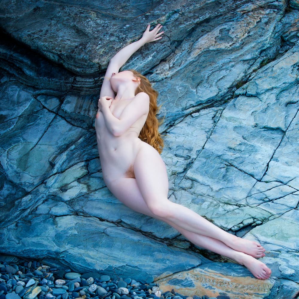 Serene Nude On Rocks by Catchlight Studio — canvas wall art