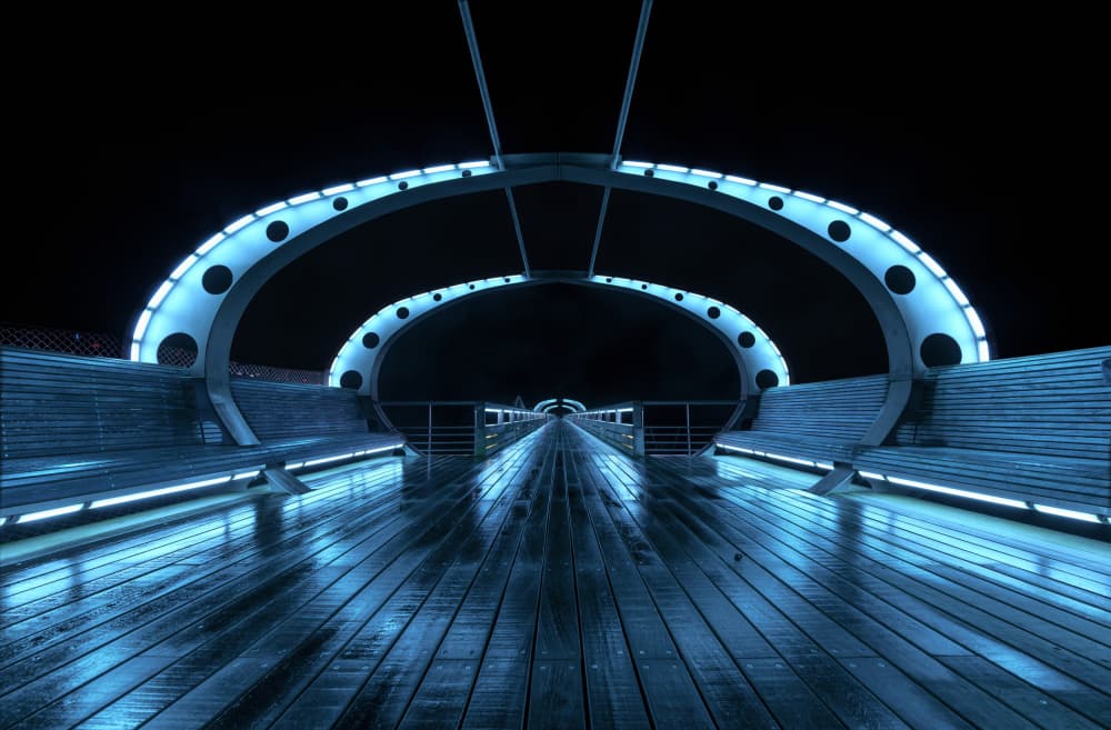 Blue Illuminated Night Pier by fotomarion — canvas wall art