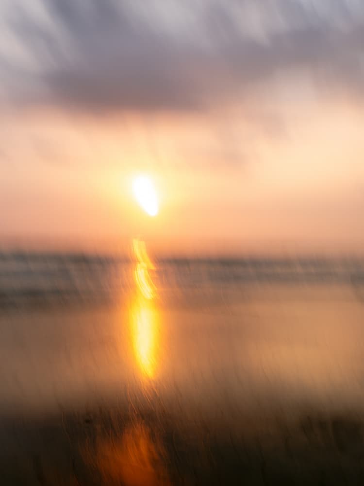 Blurry Sunset by Raisa Zwart — canvas wall art
