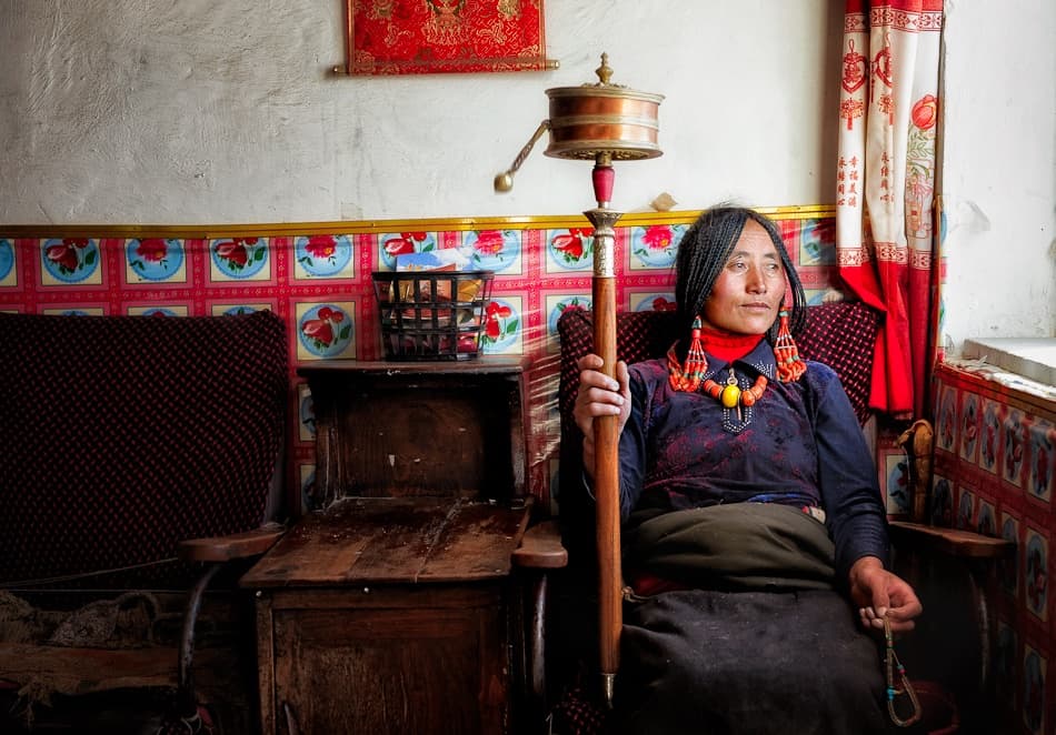 Tibetan Woman with Prayer Wheel by Nicolas Marino — canvas wall art
