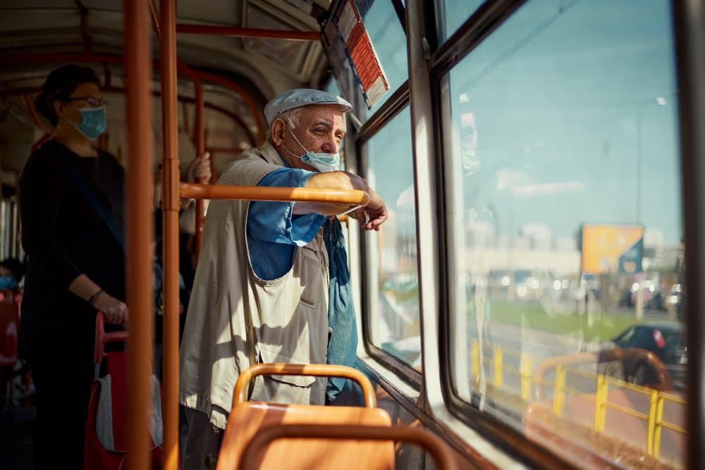 Masked Bus Passengers by Denis Malciu — canvas wall art
