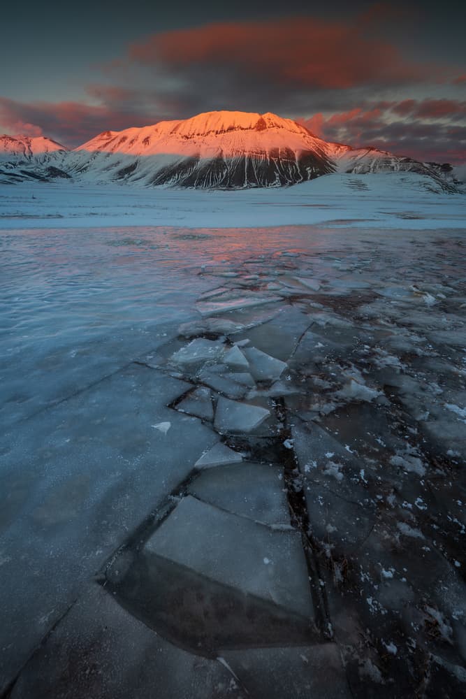 Frozen Mountain Sunset by Riccardo Lucidi — canvas wall art