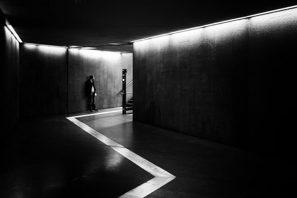Solitary Man Dark Hallway by Adam Dauria ☂ — canvas wall art