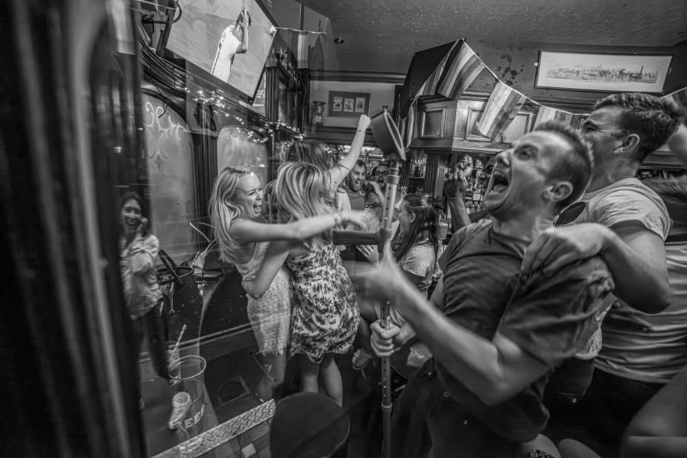 Excited Bar Crowd by Radojica Jevric fotorax — canvas wall art