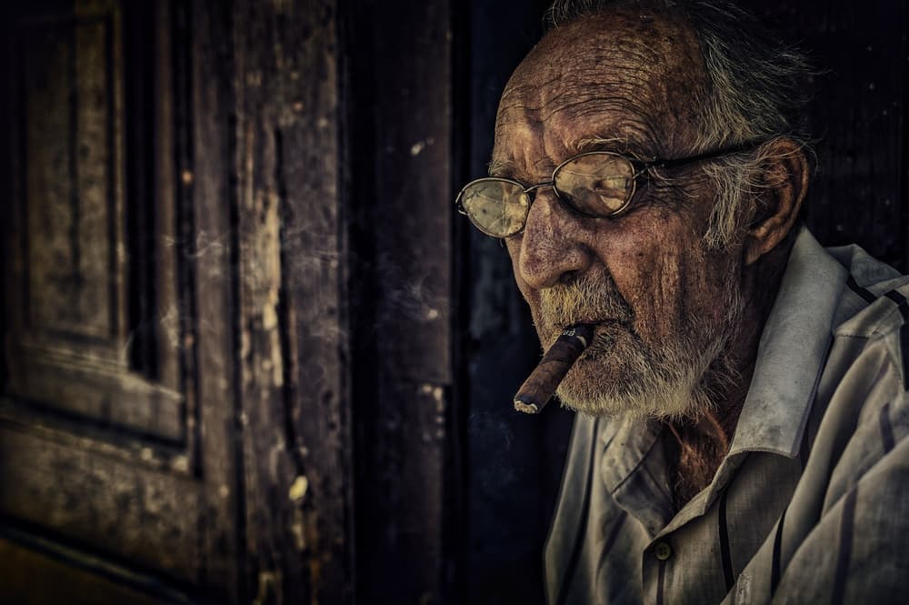 Thoughtful Man With Cigar by Pavol Stranak — canvas wall art