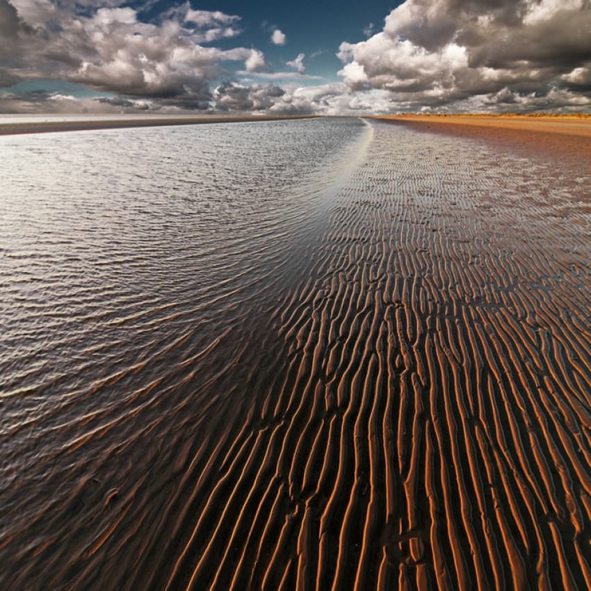 Dramatic Beach Ripples by Carsten Meyerdierks — canvas wall art
