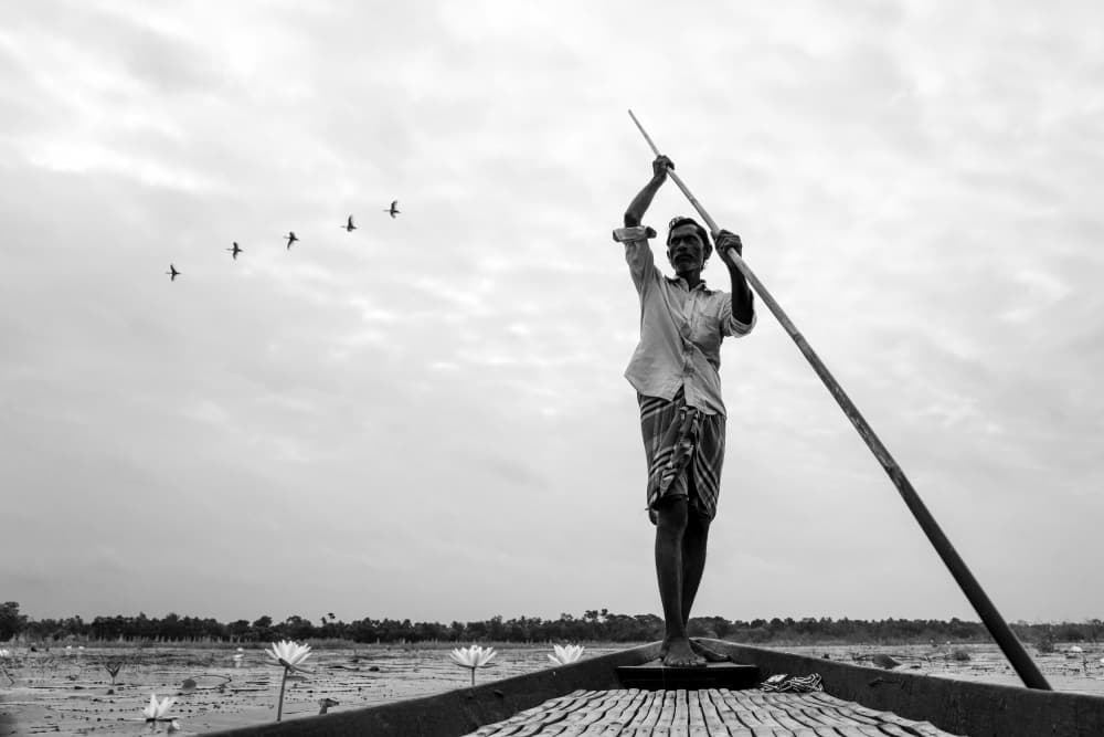 Boatman's Peaceful Journey by Rajarshi Bhattacharjee — canvas wall art