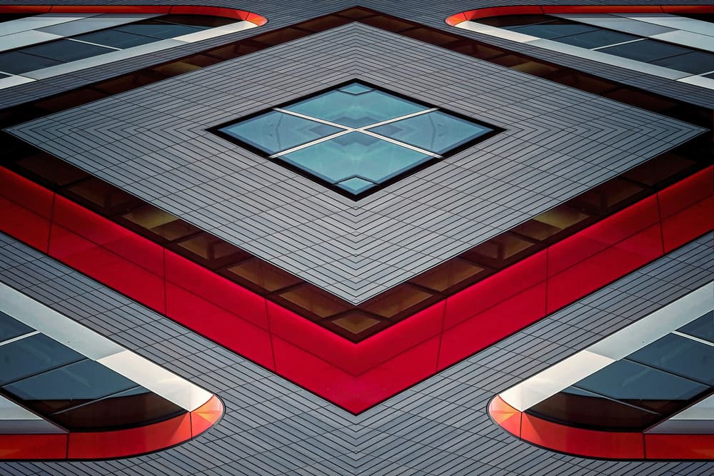 Red Geometric Facade by Henk van Maastricht — canvas wall art
