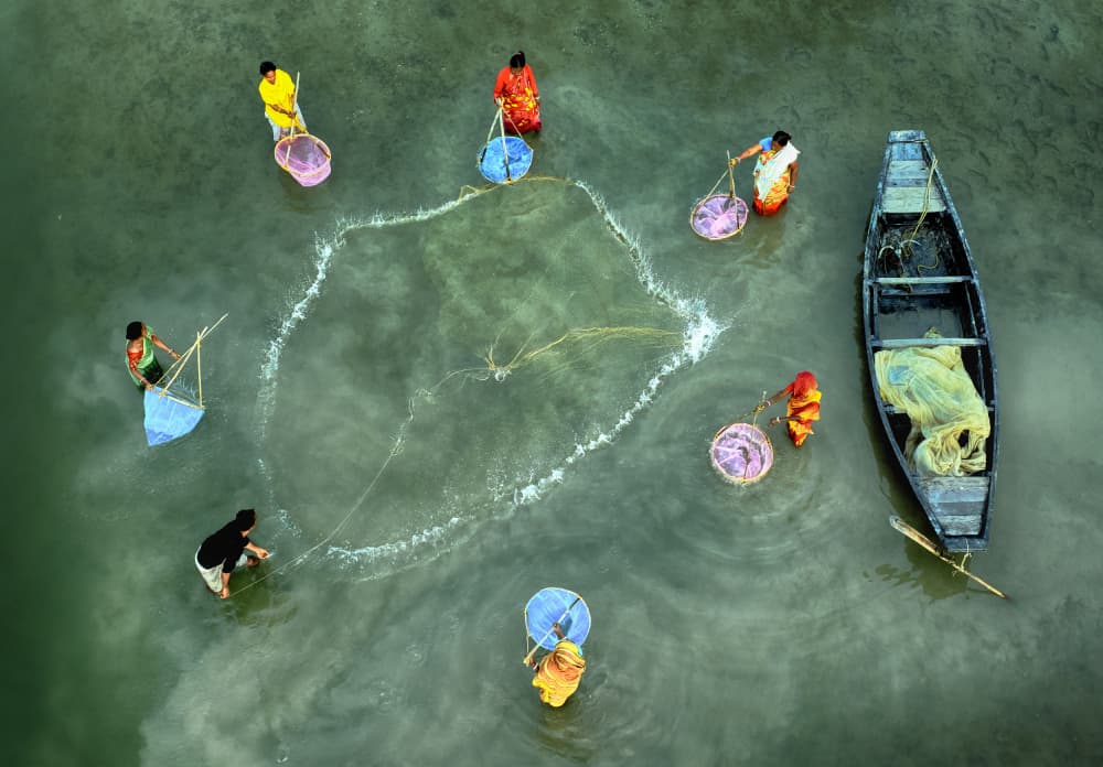 River Fishing Women by Ajit Kumar Majhi — canvas wall art
