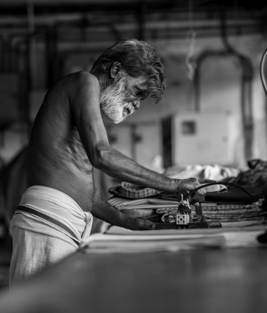 Old Man Ironing Clothes by hussain alqattan — canvas wall art