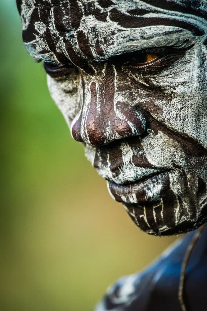 Intense Painted Face by ManginiPhotography — canvas wall art