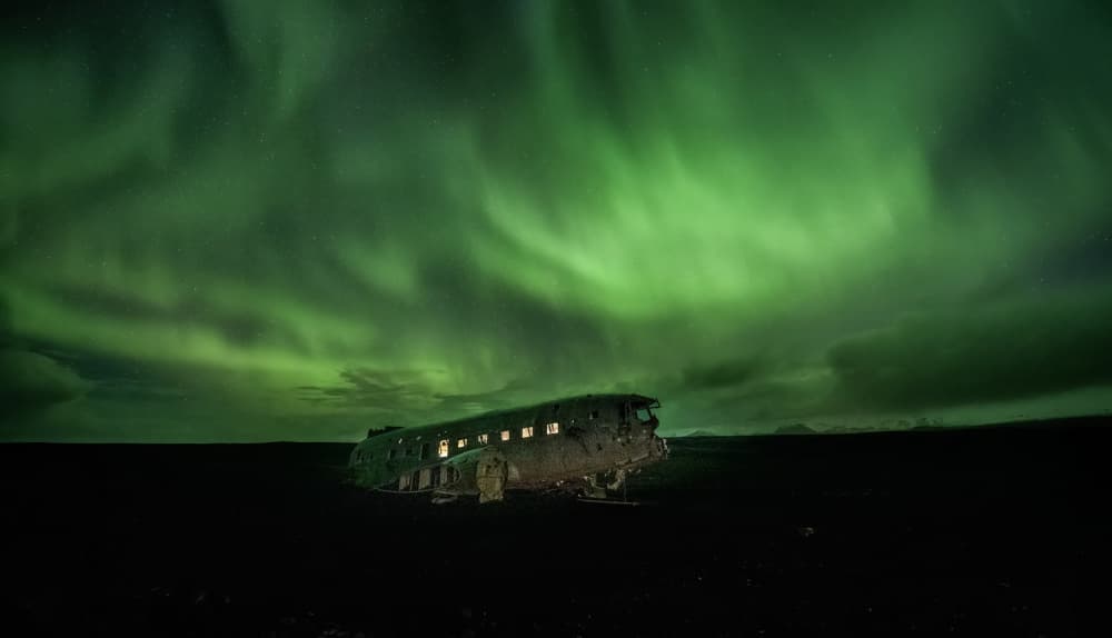 Northern Lights Plane Wreck by Alex Lu — canvas wall art