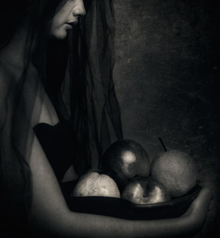 Veiled Woman Holding Fruit by Hari Sulistiawan — canvas wall art