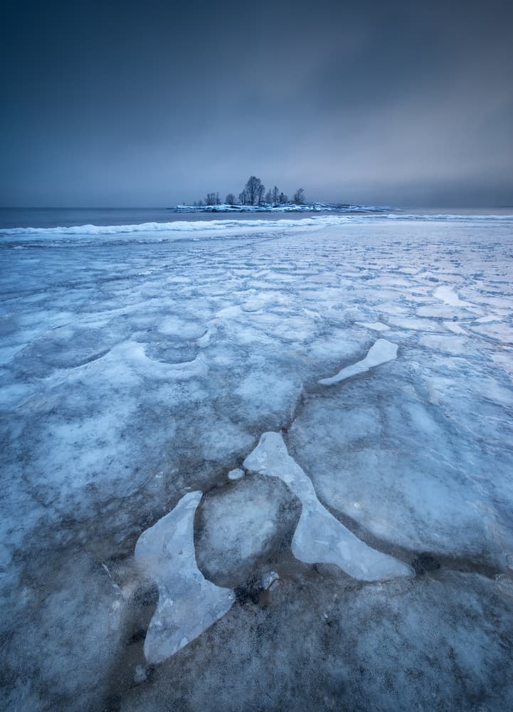 Frozen Lake Island by Claes Thorberntsson — canvas wall art
