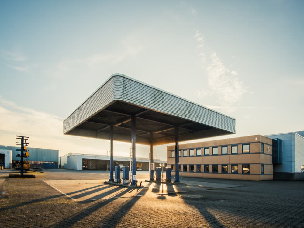 Golden Hour Gas Station by Fred Louwen — canvas wall art